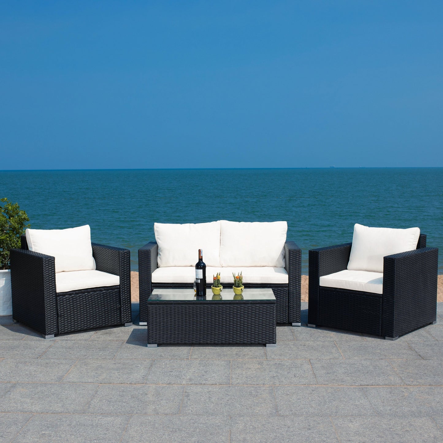Set da patio in vimini SAFAVIEH per esterni Natalee, 4 pezzi - 50L x 27P x 28A