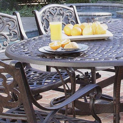 Set da pranzo per esterni Sanibel in alluminio pressofuso da 7 pezzi con tavolo ovale e 6 sedie girevoli di Homestyles