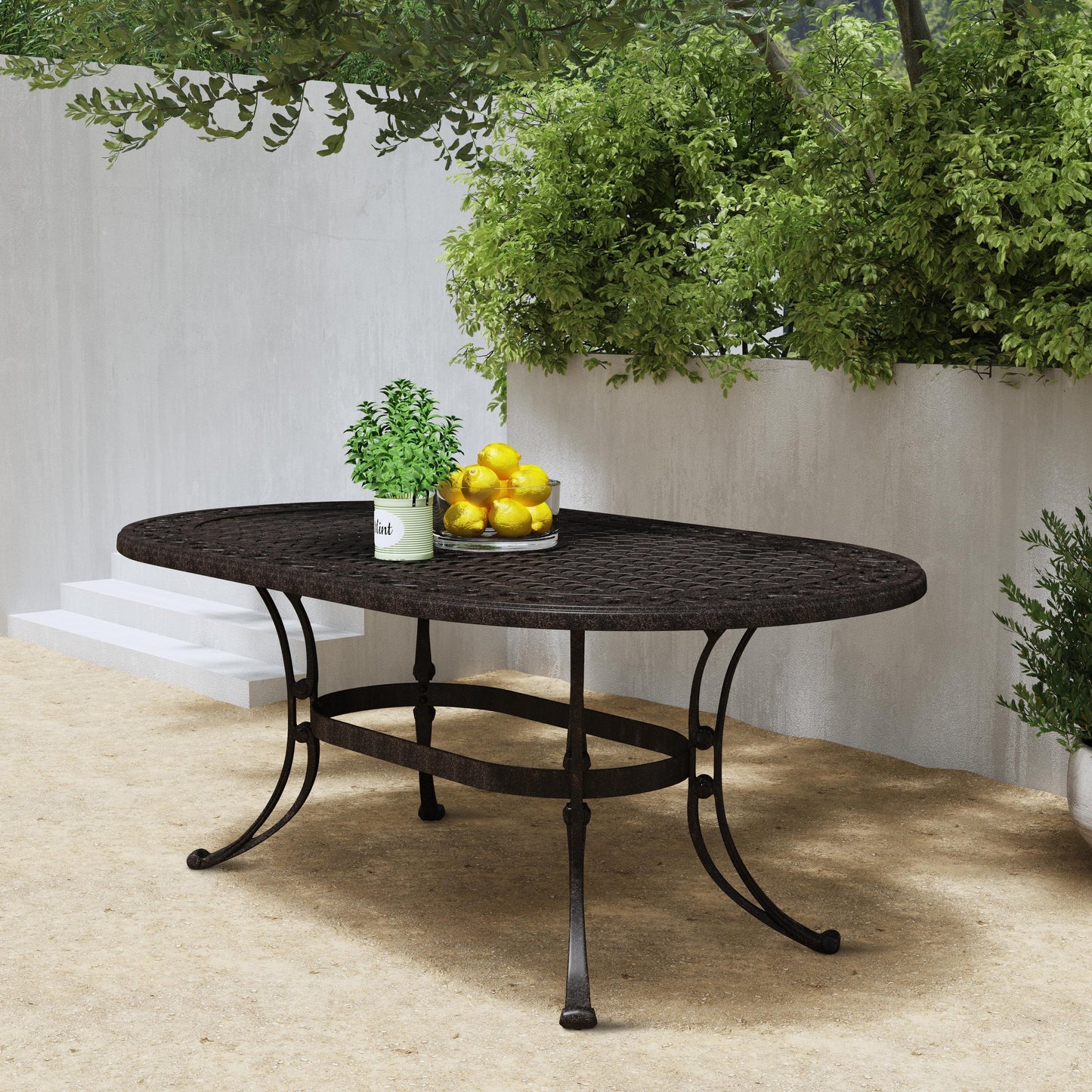 Set da pranzo per esterni Sanibel in alluminio pressofuso da 7 pezzi con tavolo ovale e 6 sedie girevoli di Homestyles