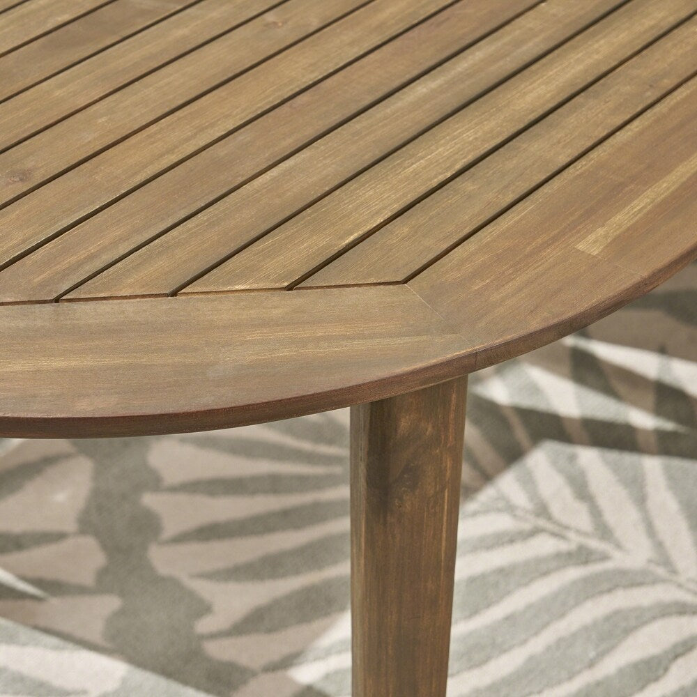 Set da pranzo da esterno Stamford in legno di acacia da 7 pezzi con tavolo ovale di Christopher Knight Home