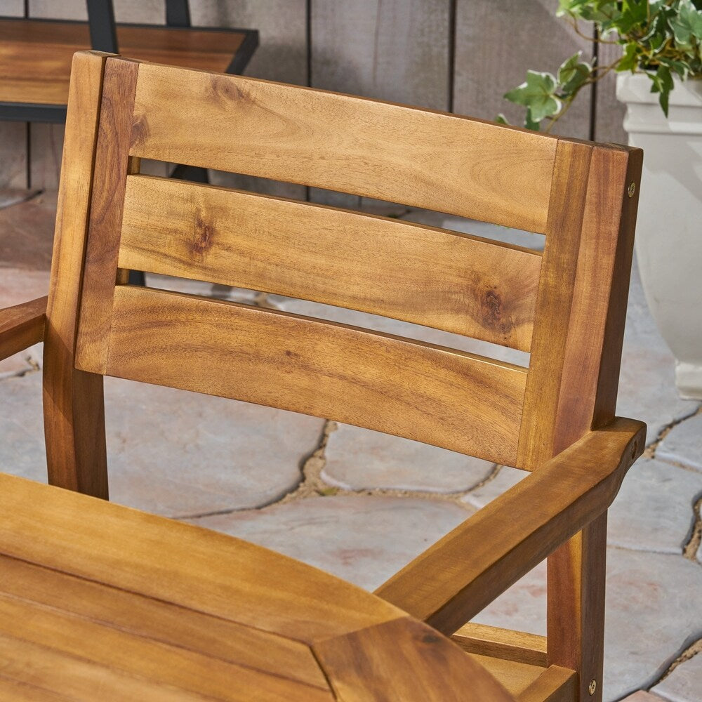 Set da pranzo da esterno Stamford in legno di acacia da 7 pezzi con tavolo ovale di Christopher Knight Home