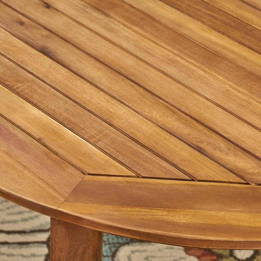 Set da pranzo da esterno Stamford in legno di acacia da 7 pezzi con tavolo ovale di Christopher Knight Home