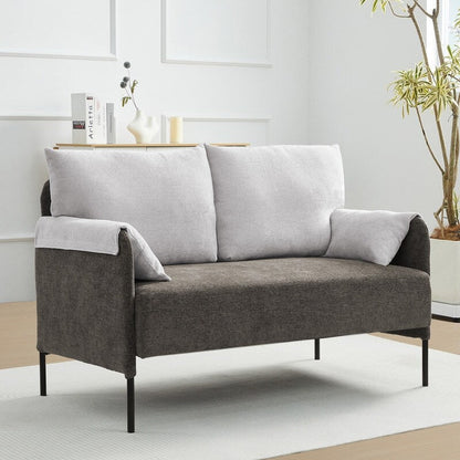 Divano a due posti bicolore con braccioli imbottiti