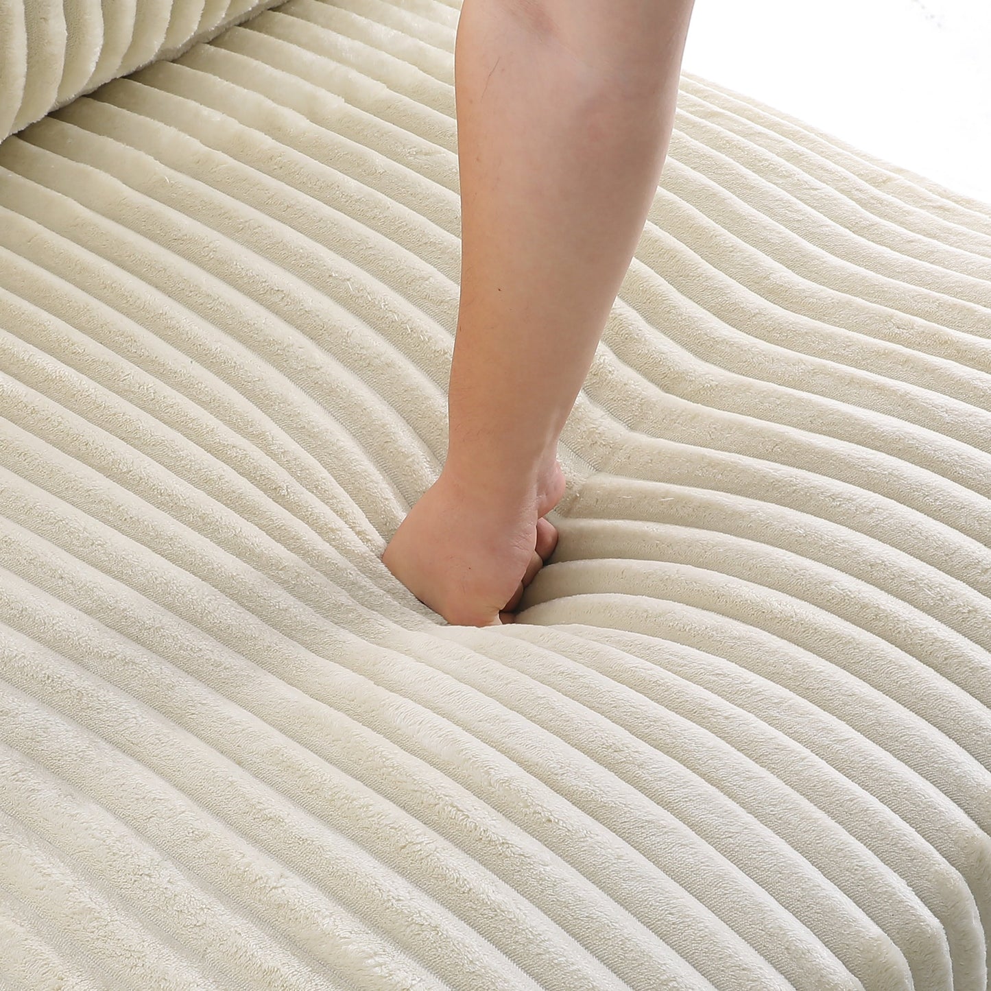 Divano modulare a L imbottito in velluto di peluche UIXE