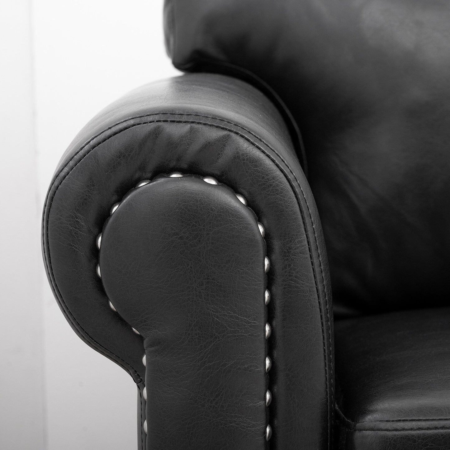 Divano imbottito a 3 posti con borchie