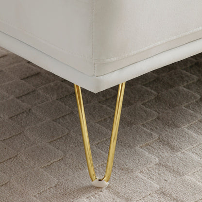 Panca imbottita con gambe dorate