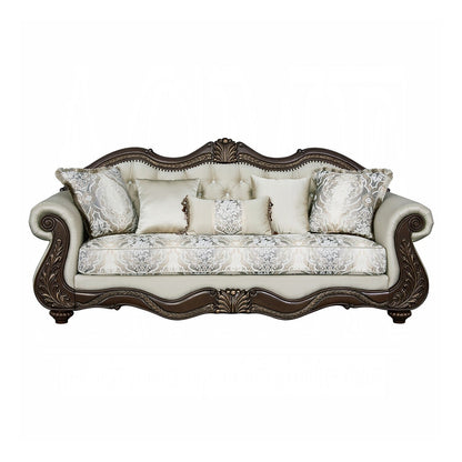 Divano imbottito con schienale capitonné in beige e ciliegio