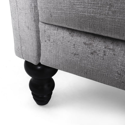 Divano a due posti in velluto con braccioli svasati e seduta profonda