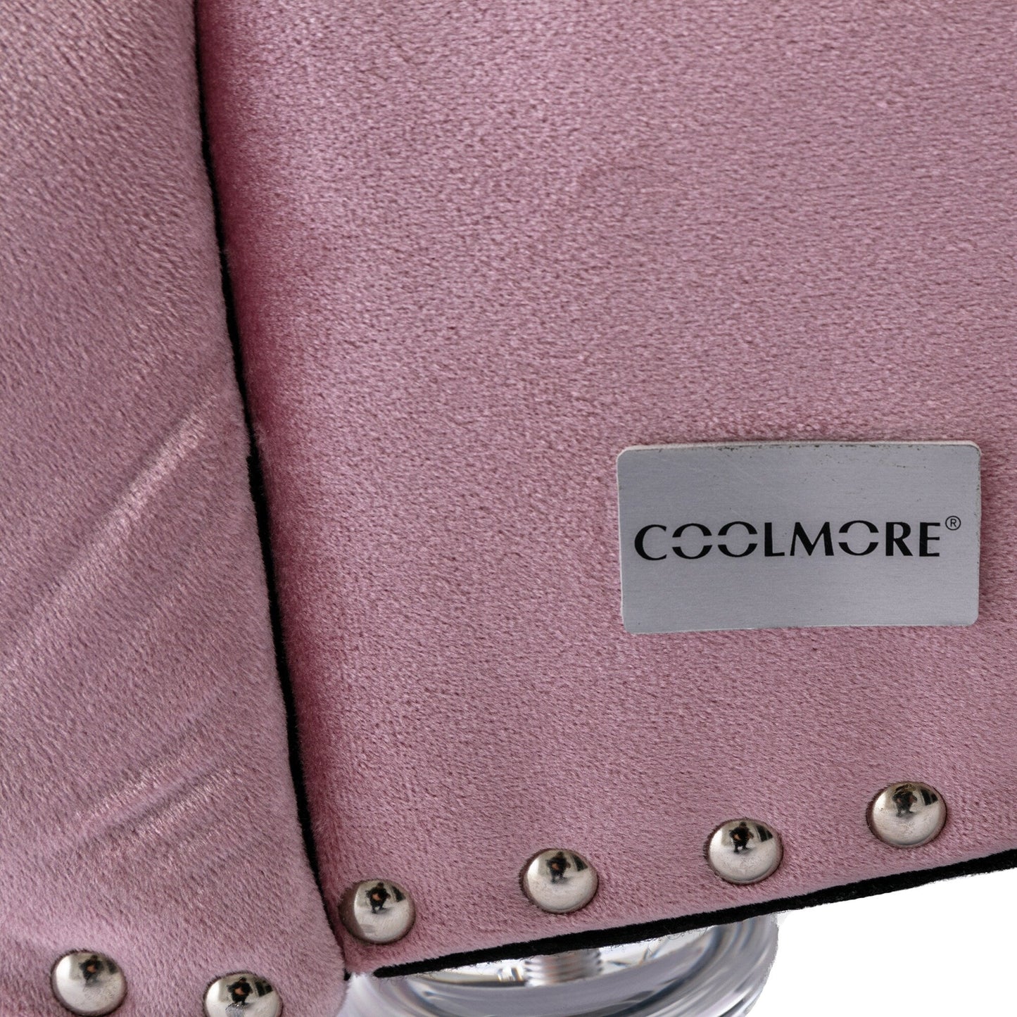 Poltrona reclinabile ergonomica a forma di S con cuscino, finiture con borchie e gambe in acrilico per uso interno.