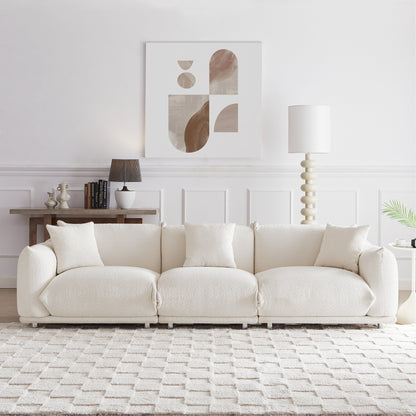 Divano bianco oversize a 3 posti con gambe in metallo