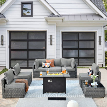 Set di mobili da giardino in vimini XIZZI da 8 pezzi con braciere